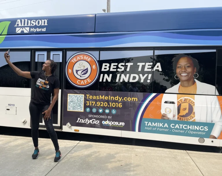 Tamika taking a selfie with her new Tea's Me Cafe Ad!